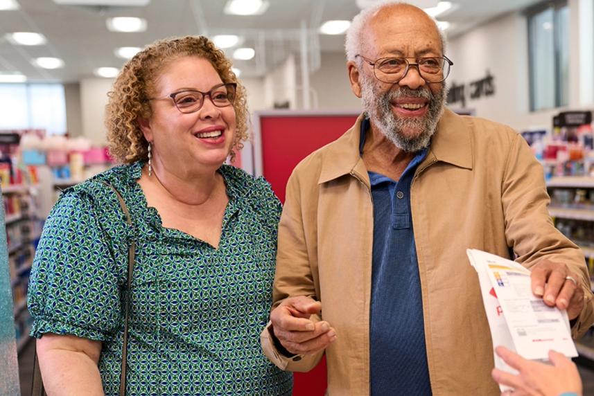 A woman holding dumbbells. 