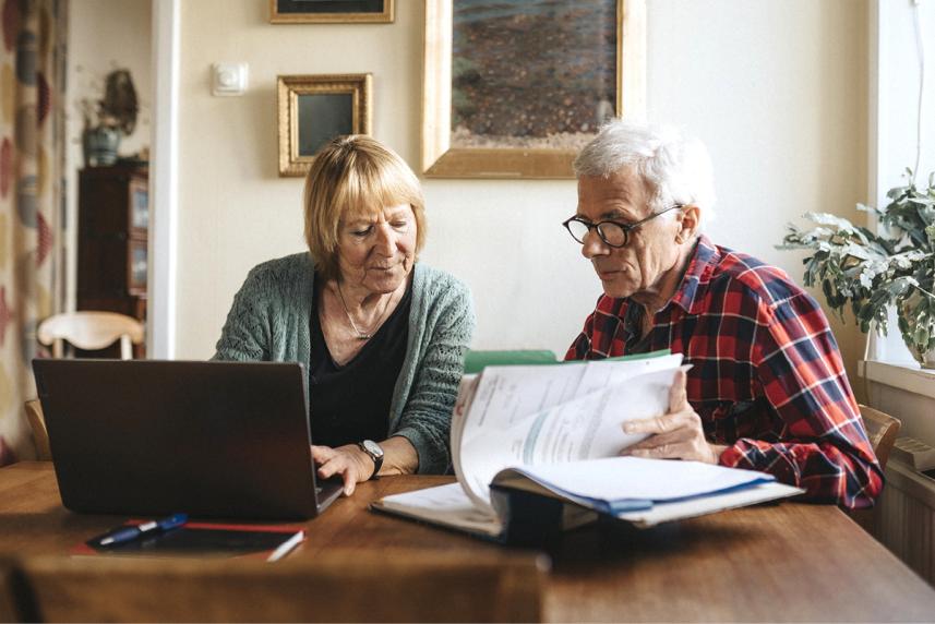 Older couple looking at paperwork