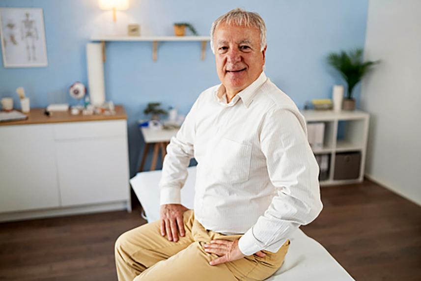 A man sitting in a doctor's office.